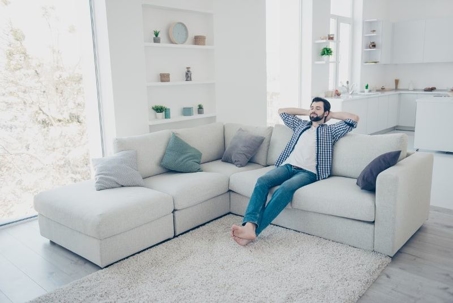 man relaxing in home