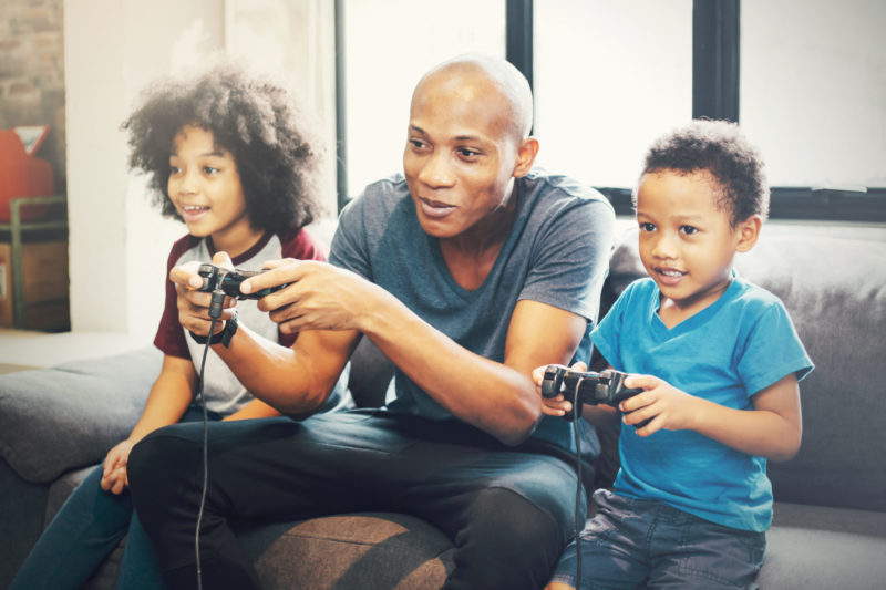 family playing video games in the comfort of their Norfolk, VA home