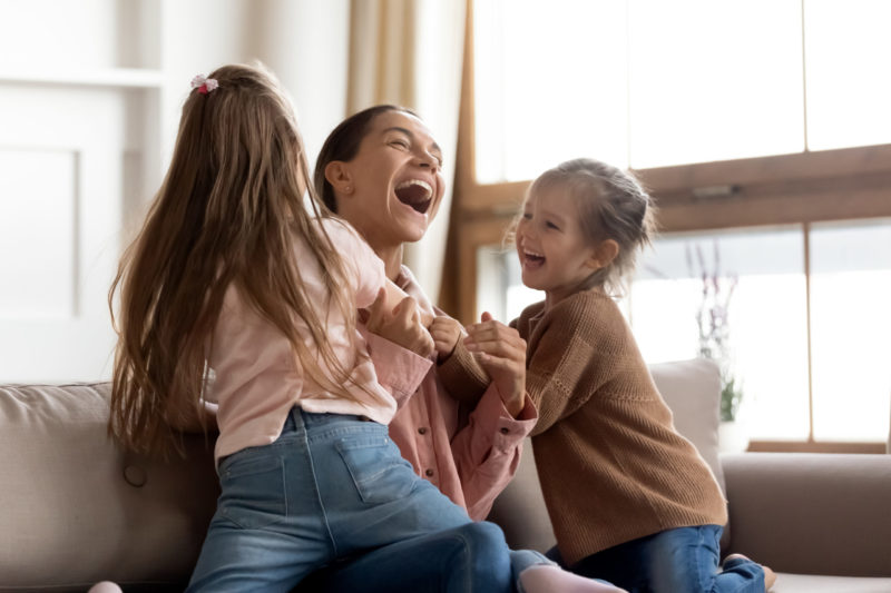 Mother And Daughters Play Together In Virginia Beach, Va Home